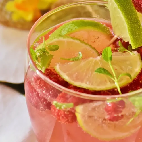 pink and green spritzer in a glass