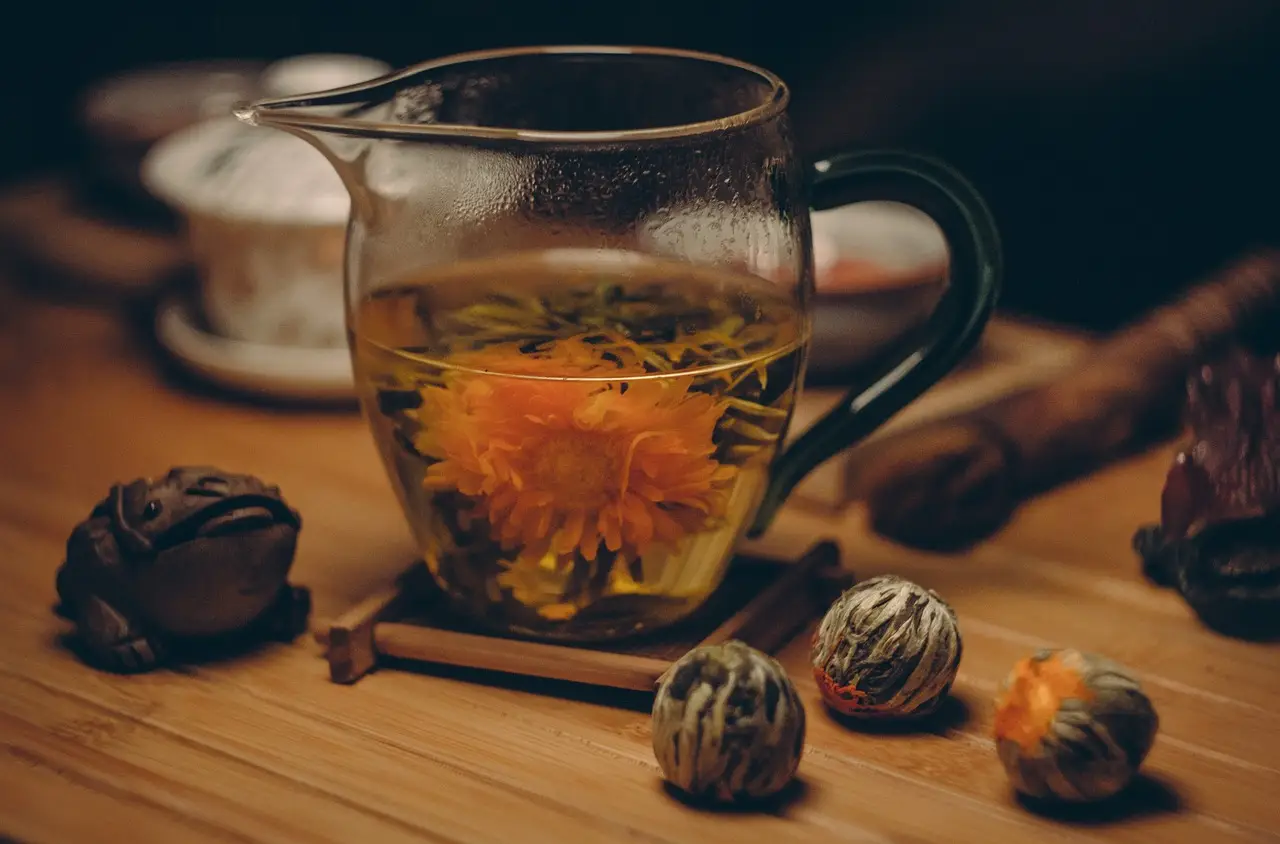 glass mug with a blooming tea